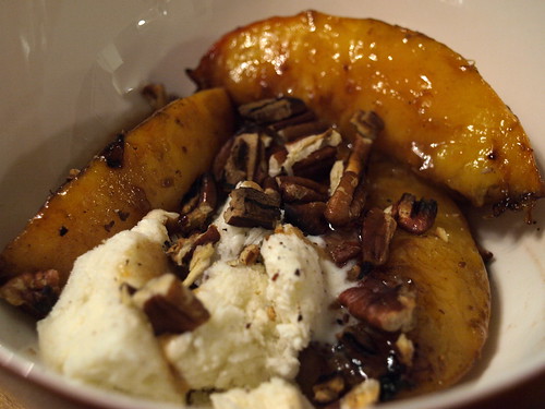 grilled peaches with ice cream and toasted pecans