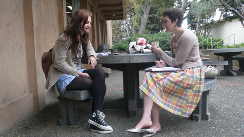 Campus Chic’s Chloe Schildhause chats with the stylish Lucy Hamilburg outside University Center about her outfit and fashion inspiration.  Photo by Sky Madden/Foghorn
