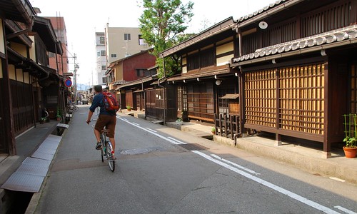 biking through sanmachi district, takayama