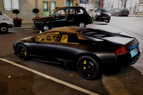 The black one unfortunately is not a Reventon but a matte black vinyled 