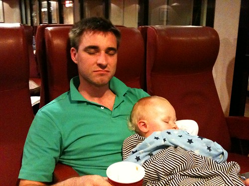 Jimmy sleeps on daddy, who sleeps on the ferry, en route to France