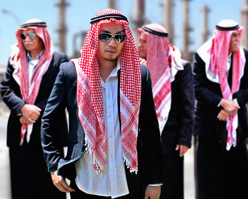  Model wearing own clothing Arabian men background oil refinery 
