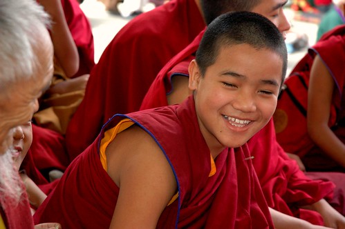 Laughing! A young monk with an elder monk, Tharlam Monastery Courtyard, Boudha, Kathmandu, Nepal by Wonderlane