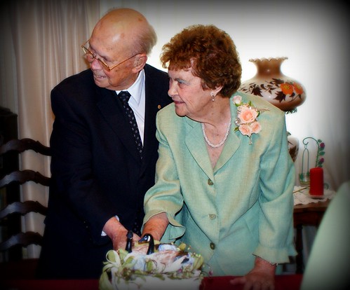 Grandpa & Grandma cutting the cake