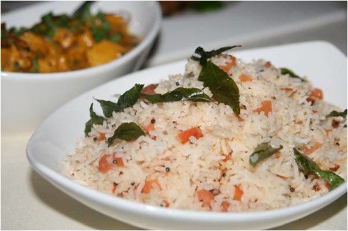 Tomato flavored Indian basmati rice was fluffy and infused with curry leaves, saffron, and mustard seed.