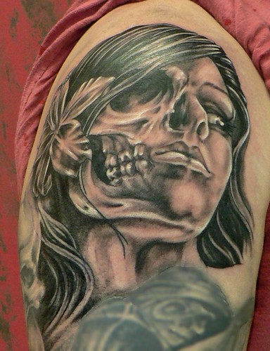 Skull face Girl, done by Mr. Red Dog Tattoo in Benalmádena.