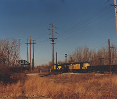 Northbound Chicago & NorthWestern Railroad transfer train passing through Argo Junction. Summit Illinois. December 1990.