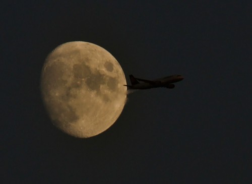 Moon and plane