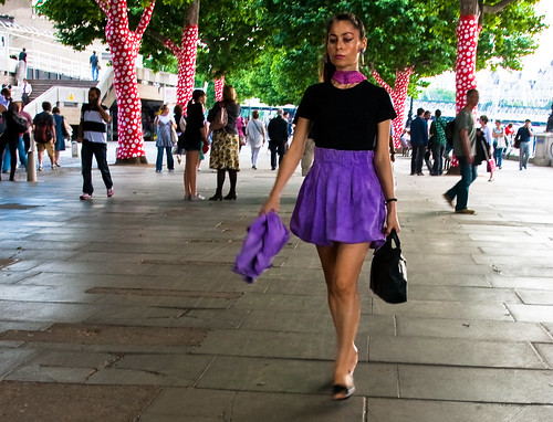 Lady in a purple skirt, and polka dot trees