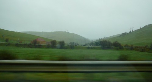 3 of 12: Rainy Landscape out the car window
