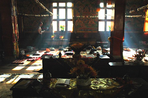 Dharma student studies after the Hevajra empowerment on Bodhisattva day, inside Tharlam Monastery of Tibetan Buddhism, Bodha, Kathmandu, Nepal by Wonderlane