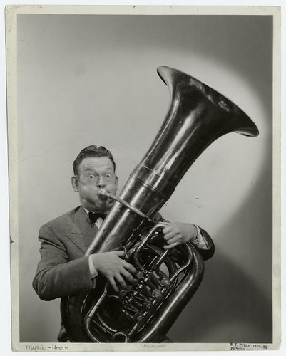 [Man playing the tuba.] by New York Public Library