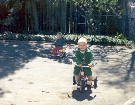 Alyce and Her Brother on Tricycles (Click to enlarge)