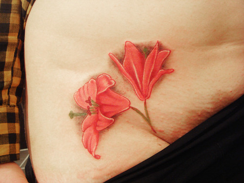 Custom Micro lilly flowers tattoo