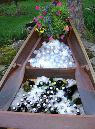 The boat and wagon can be rented at Vermont Wedding Props beverage display3