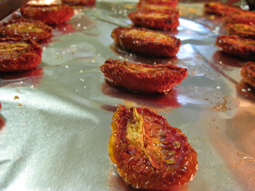 oven roasted tomatoes on baking sheet