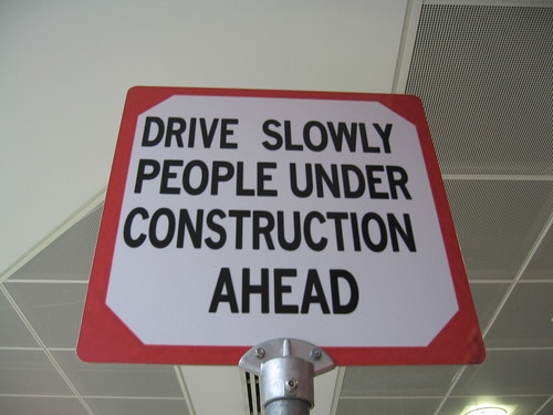 Drive Slowly - People Under Construction Ahead
