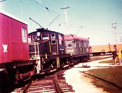 Electric trolley freight motors at work switching museum rolling stock. The Illinois Railway Museum. Union Illinois. November 1976.