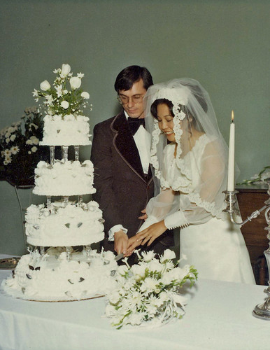 My parents wedding in 1977 above I actually wore my mom's dress for my 