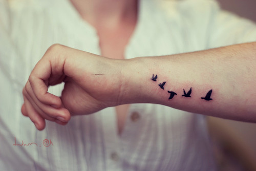 Birds flight on her wrist. What a lovely idea. I love to do tattoos like 