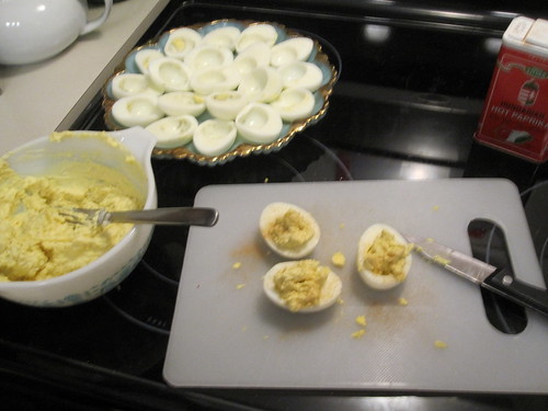 Making devileded eggs and eating a few!