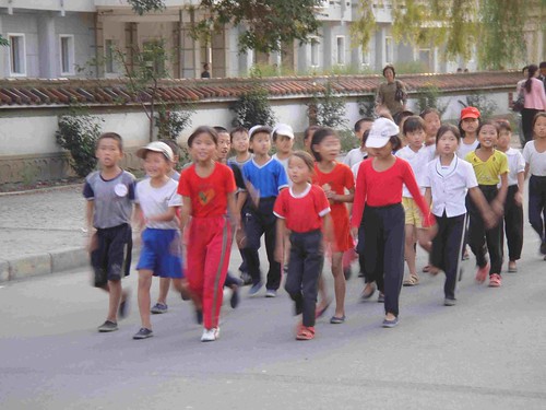 north korean women marching. Students marching in Sariwon