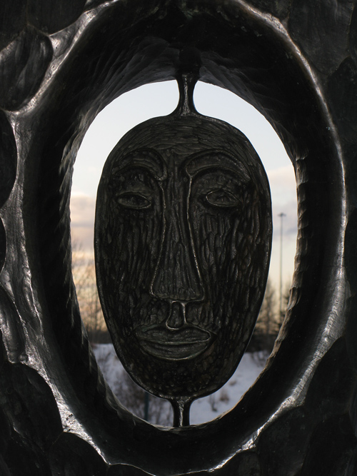 face in sculpture at entrance to the Alaska Native Heritage Center, Anchorage, Alaska