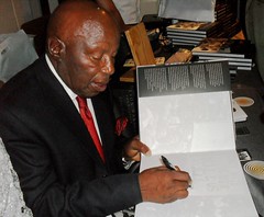 Alf Kumalo signs the first book