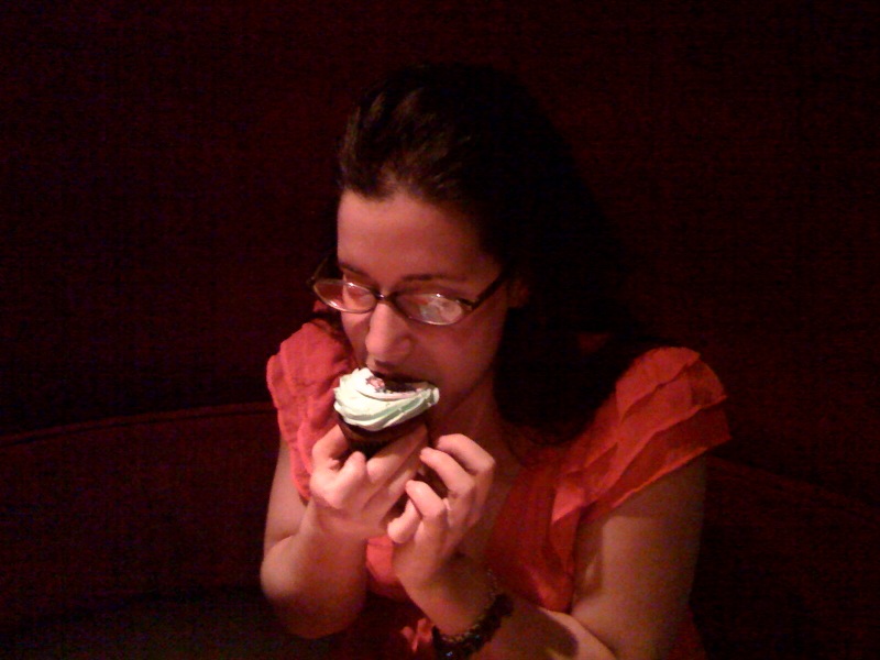 Me eating my logo cupcake by Treat