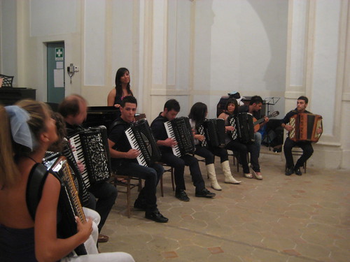accordion octet, with guitarist and singer