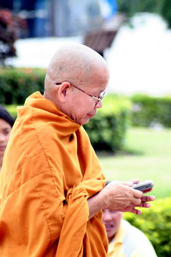 The Texting Monk - Vientiane, Laos