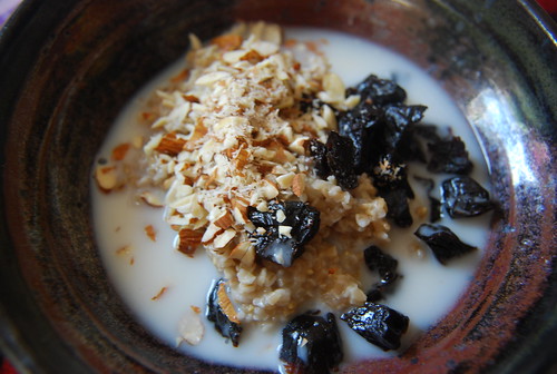 Steel cut oatmeal with almonds, prunes and almond milk
