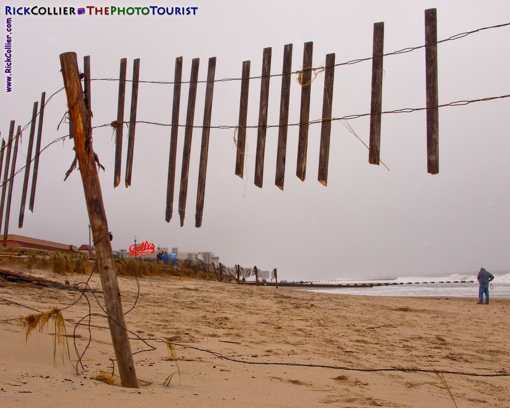 The remains of a sand fence frame the beach at Rehoboth Beach, Delaware, USA, following a nor'easter storm in November 2009.