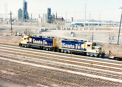 Westbound Atchinson, Topeka & Santa Fe empty flatcar train. Chicago Illinois. Early April 1989.