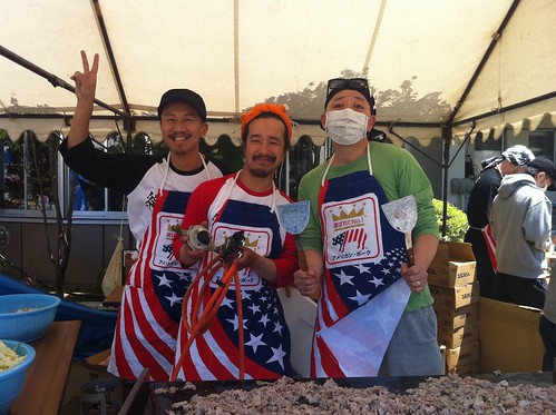Local volunteers serve up fried “Udon” noodles with slices of U.S. pork at a shelter housing 260 people in the city of Kesennuma. 