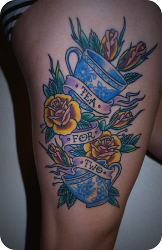 tattoo on girls thigh. Teacup tattoo- session two