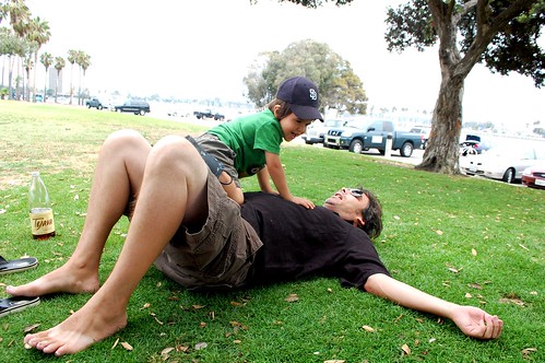 Joaquin wrestling Dan at the park