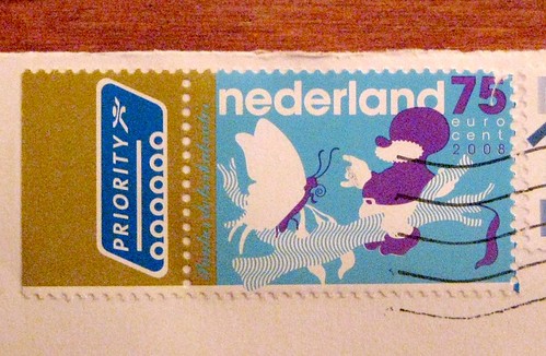Dutch gnome with butterfly stamp