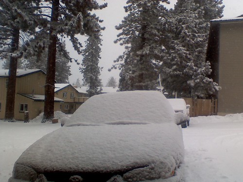 Waking up to snow falling in Tahoe. You can barely see our Toyota #fb
