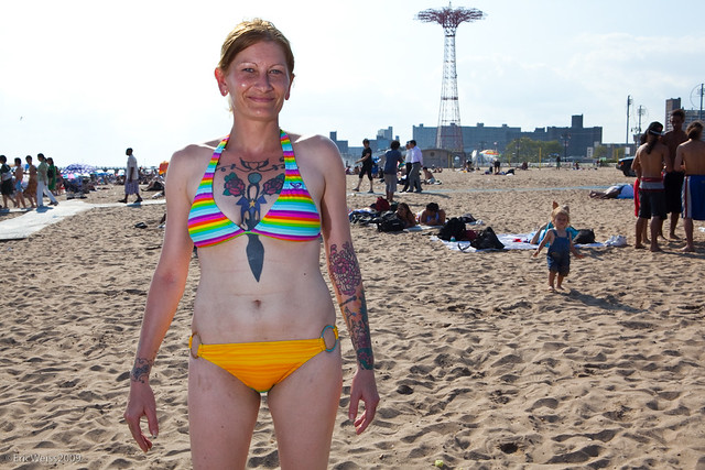 Coney Island Beach: Tattoo lady. Voyeuristic shots on the beach at Coney 
