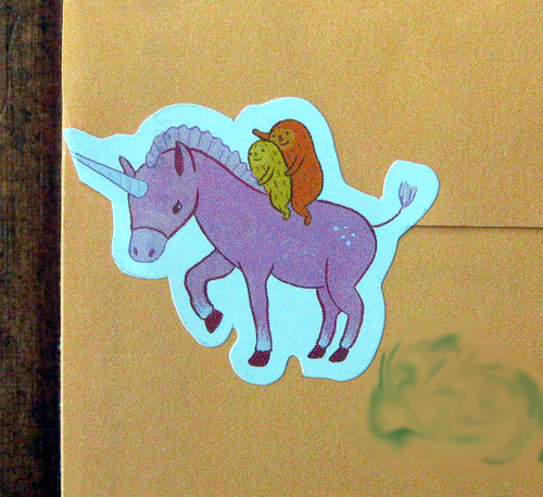 Happy Hermits ride a unicorn