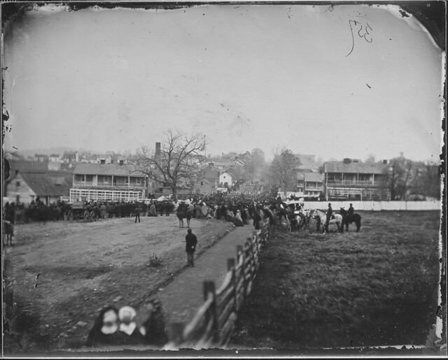 Regiment marching down a village street Gettysburg Pa by The US National Archives