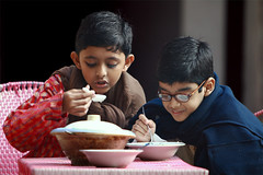 Boys are taking breakfast on EID day