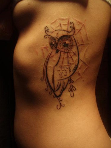 owl tattoo done by thomas jacobson
