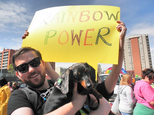 A photo of myself and my dog Max at the 2011 Pride Parade in Edmonton.
