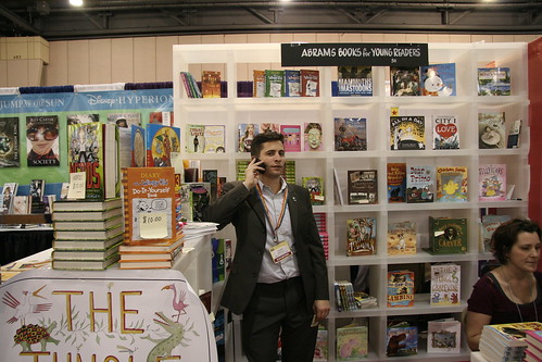 Jason Wells at the ABRAMS NCTE booth
