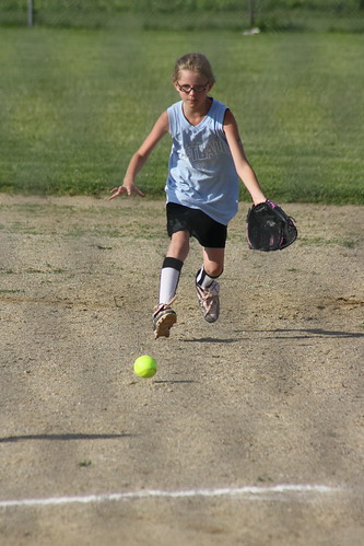 Brenia playing softball