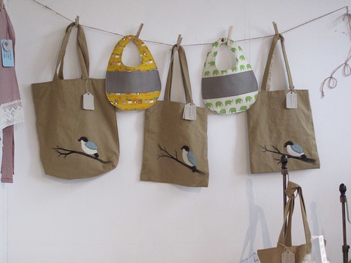 Bags by Sylvia Min, Bibs by Chase Clark
