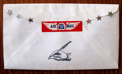 Via air mail, with wings