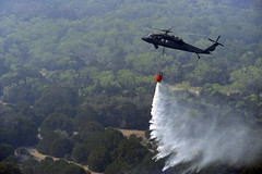 Blackhawk drops water over hot spots